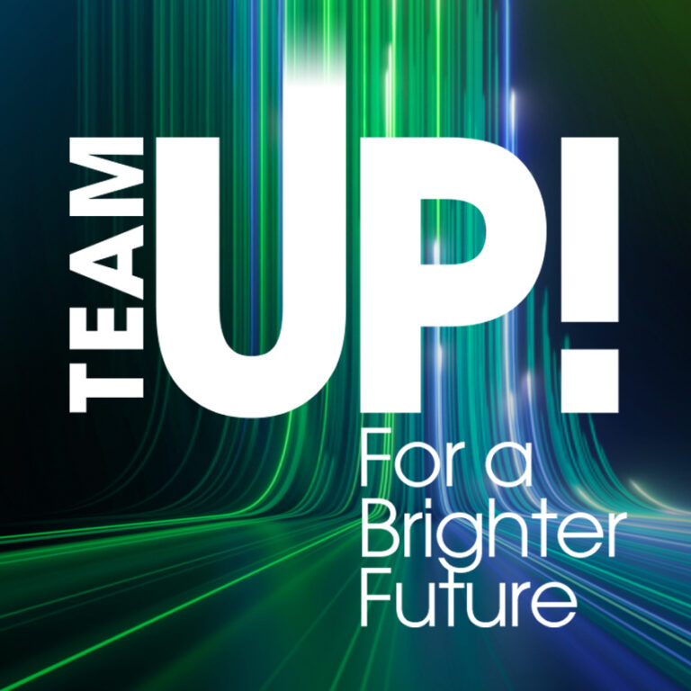 Black design with bright blue and green lights running vertically up the graphic, hexagonal text bubbles, and white text: “TeamUp! For a Brighter Future"
