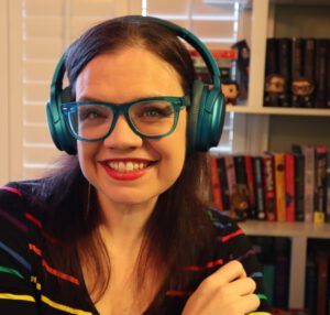 A headshot of Casey Fiesler smiling at the camera